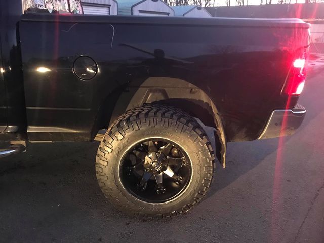Dark pickup truck at night